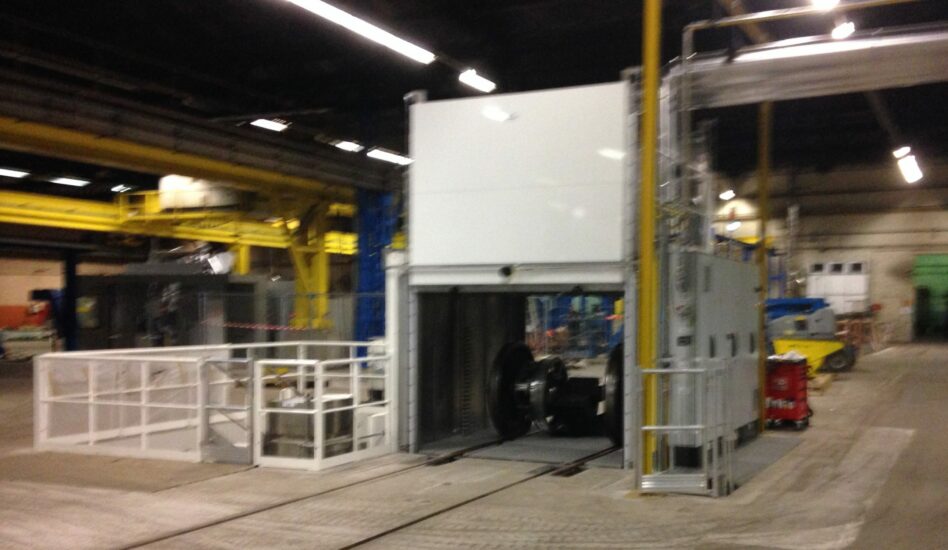 Railway axle cleaning in degreasing machine
