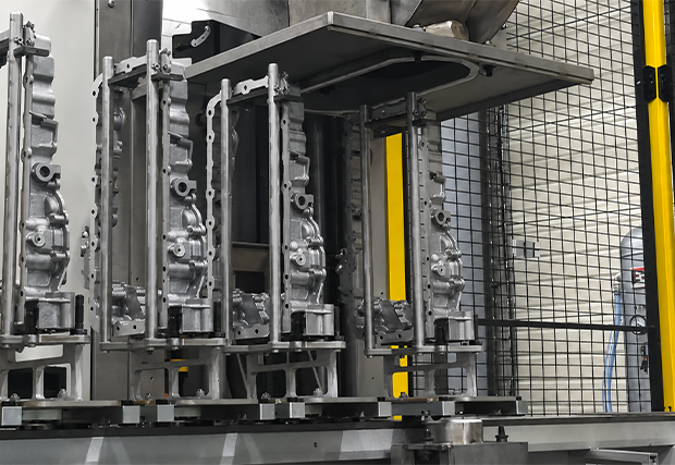 High-throughput degreasing and particulate removal machine for the automotive sector
