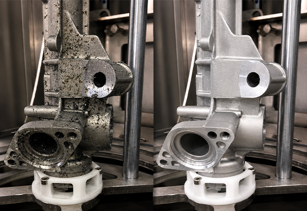 Comparison of a car part before and after machine cleaning