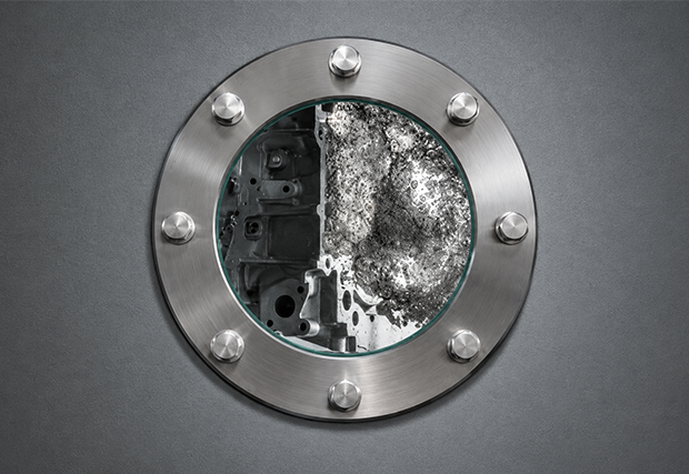 Illustration: Forced immersion of a workpiece, as seen through a viewing window