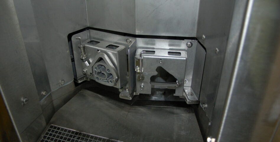 Fixture of a carousel parts washer