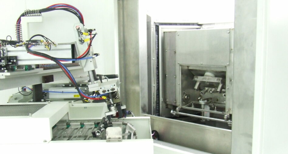 Fixture robot for carousel parts washer
