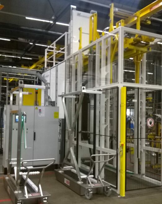 Parts cleaning machine with automatic loader